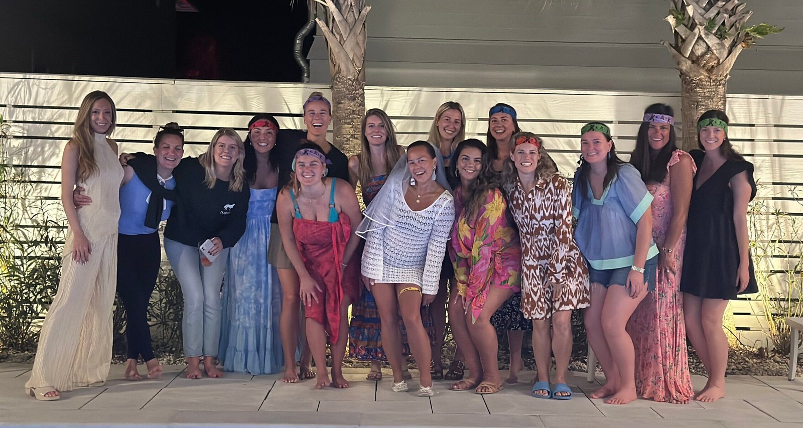 Group of women celebrating at a bachelorette party, enjoying a hibachi dinner with friends, laughter, and a lively atmosphere.