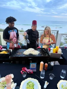 Hibachi chef performing at a party in the 30A area