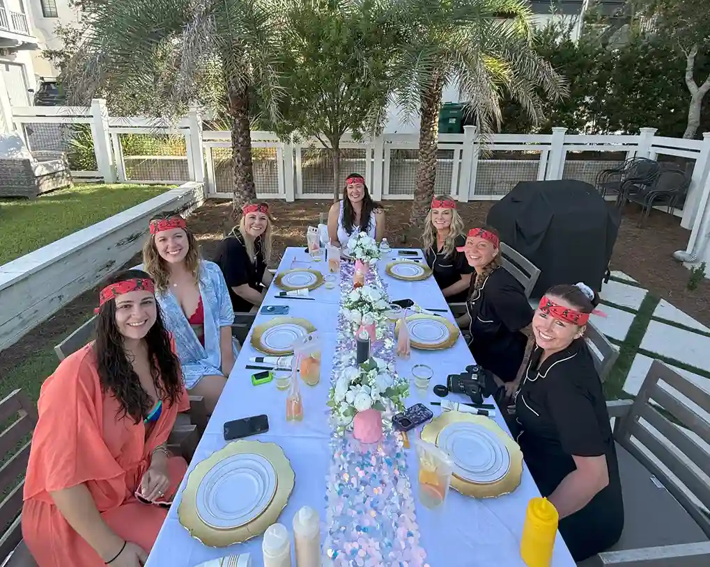 Backyard hibachi catering in Santa Rosa Beach with guests enjoying a private hibachi chef experience